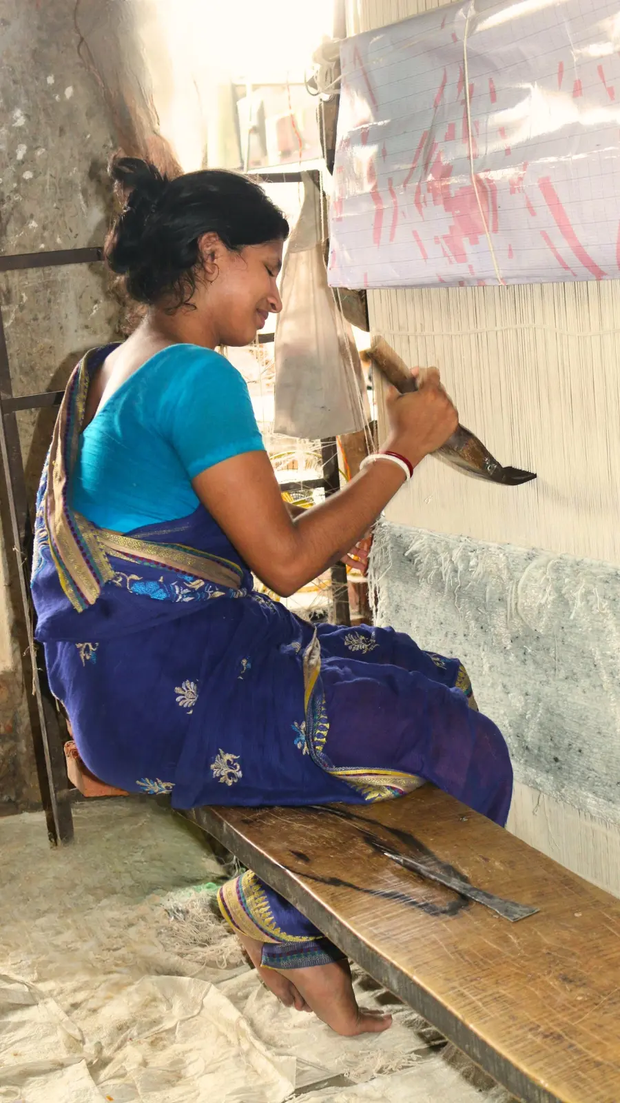 Master artisan hand-knotting traditional Persian-style wool rug in Jaipur workshop - authentic handmade carpet India heirloom quality